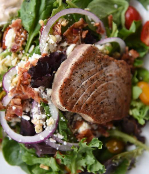 The grilled tuna & bacon salad from the Blue Water Grill Restaurant in the Pirate's Cove Marina.