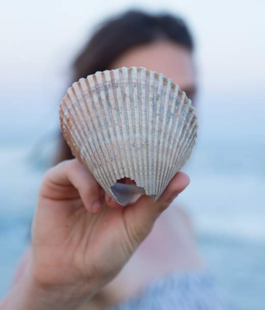 Girl Holding Shell