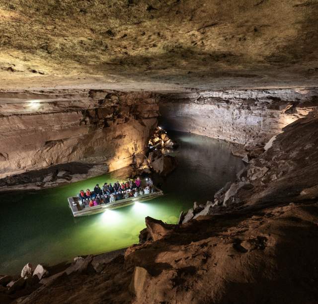 People Boating Through Lost River Cave