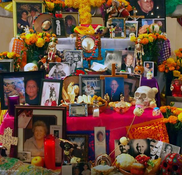 Day of the Dead altar with photos