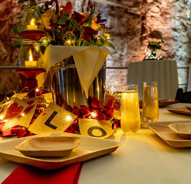 Romantic dinner setup inside cavern