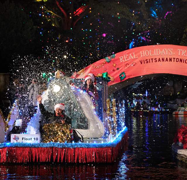 Holiday float with fake snow falling on it