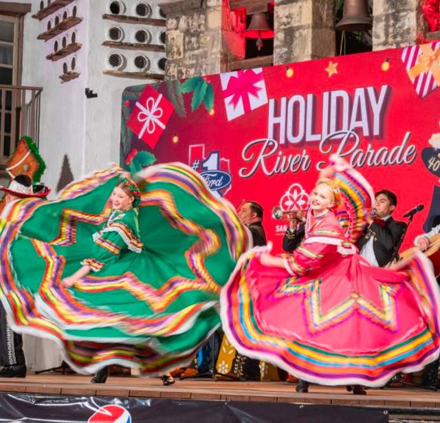 Folklorico dancers dancing onstage
