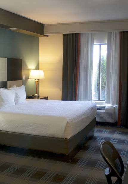 king size bed in hotel room