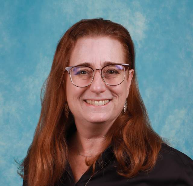 Paige Cox professional headshot.