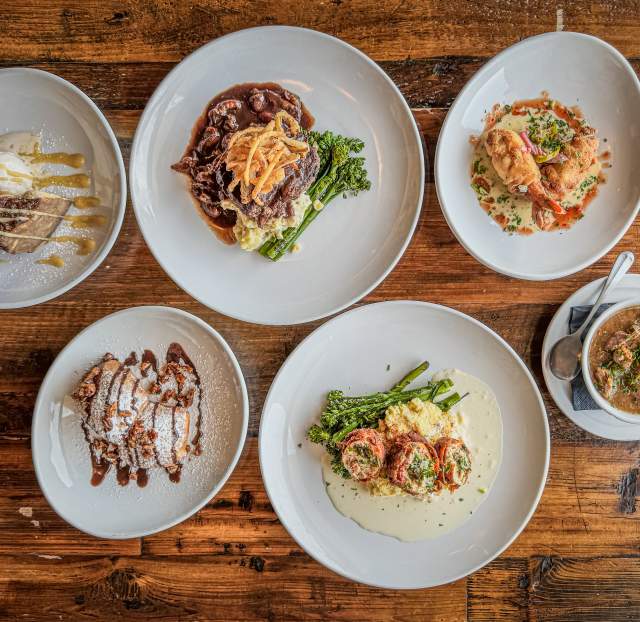 Plates of food from Mouth of the South.