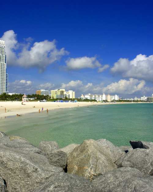 Blue-green surf and shoreline of South Beach in Miami Beach