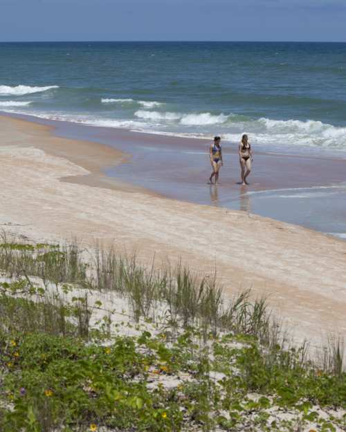 ladies walking the beach