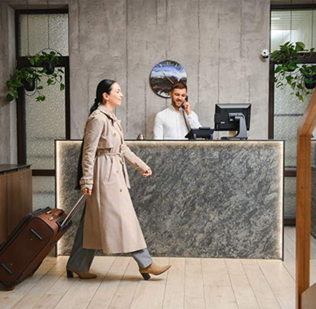 Business woman walking in hotel