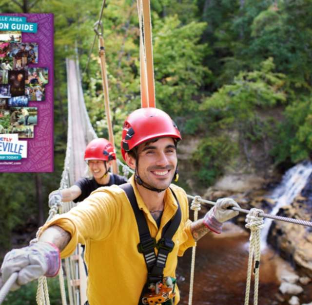 Men enjoying a day at Cumberland County's ZipQuest with the cover of the Greater Fayetteville Digital Destination Guide