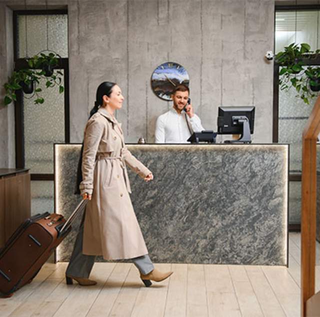 Business woman walking in hotel