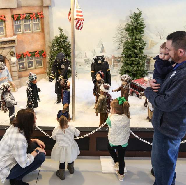 Family at "A Christmas Story" Comes Home exhibit