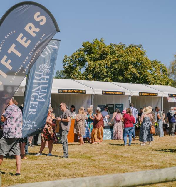 A group of people enjoying the Gin Festival Arrowtown