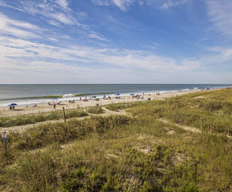 A picture of the beach and dunes in the Crescent Beach neighborhood of North Myrtle Beach