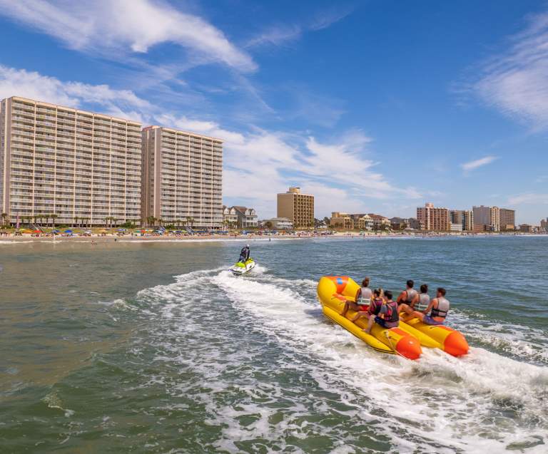 People Banana Boating Near Crescent Beach, SC