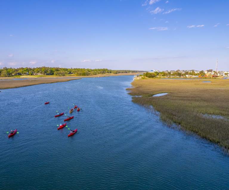 Aerial view of Kayaks in the cherry grove marsh
