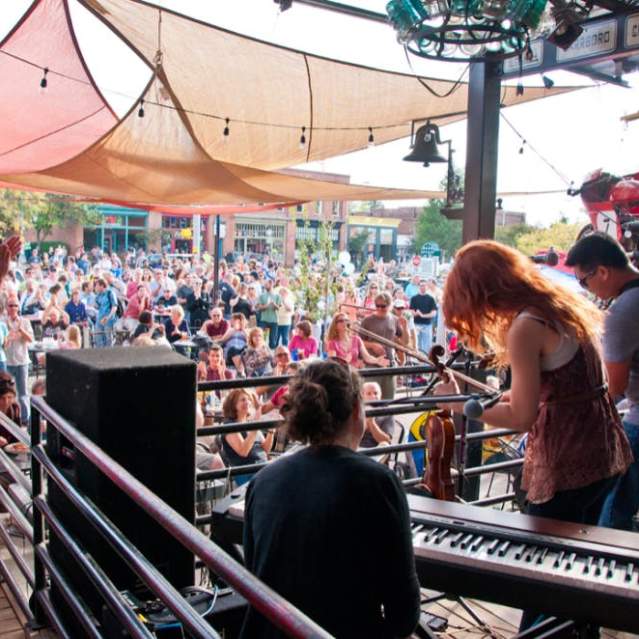 A crowd listening to music during a previous Carrboro Music Festival