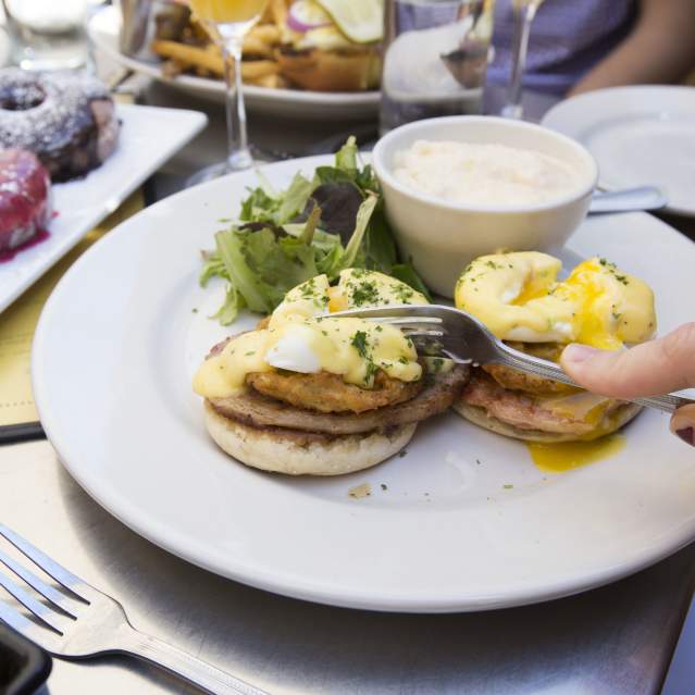 Plate of Eggs Benedict and Fried Green Tomatoe