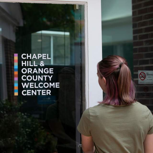 Person Entering the Welcome Center Front Door