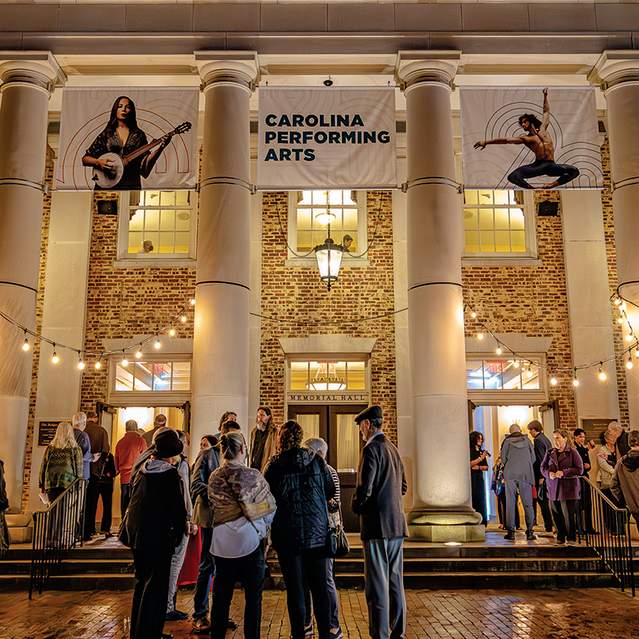 People gathering outside Memorial Hall for a Carolina Performing Arts event
