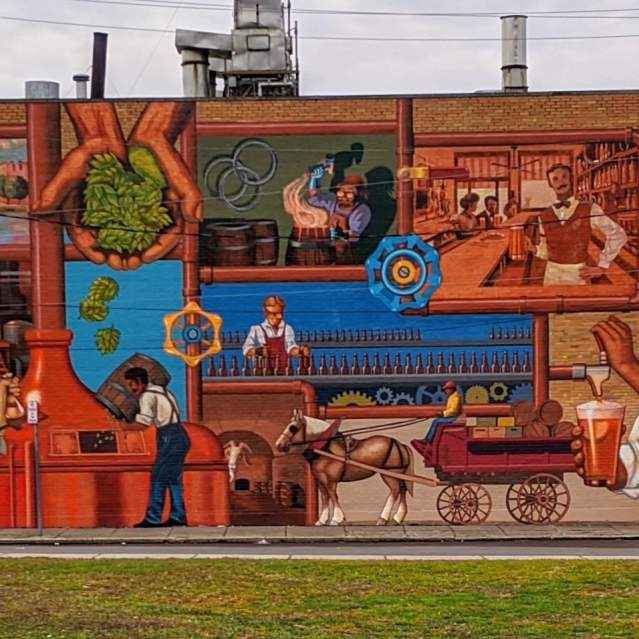 A mural depicting the history of brewing beer in Cincinnati