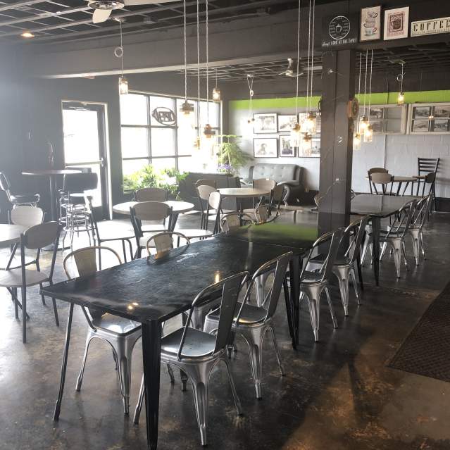Open tables at Perk City Coffee await Knoxville's coffee aficionados.