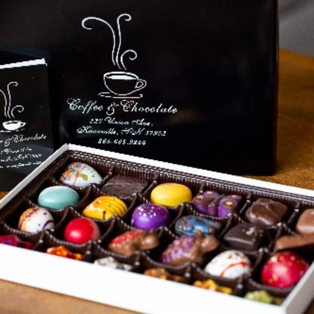 A box of brightly-colored chocolate treats from Knoxville's Coffee & Chocolate.