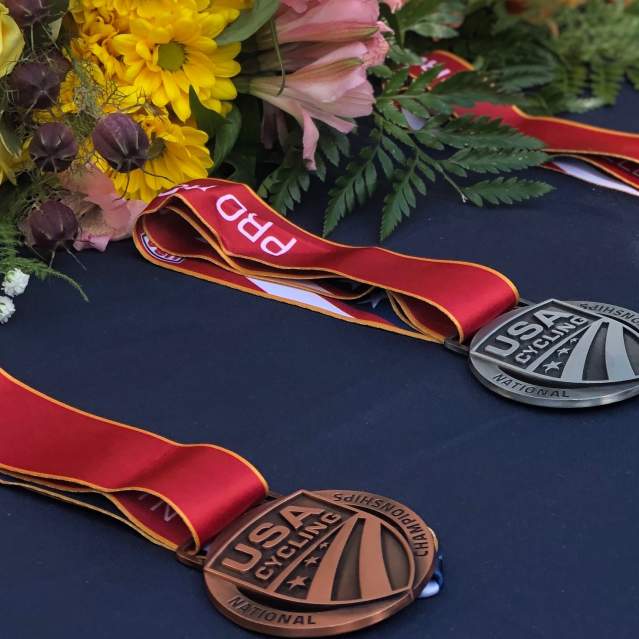 Olympic medals laid out on a table