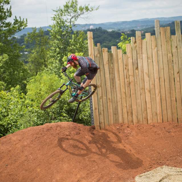 Bicyclist at The Devils Racetrack Hitting a Jump
