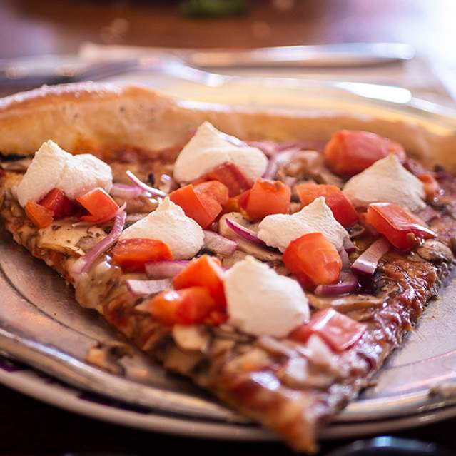 Pizza slice at Satchel's Pizza