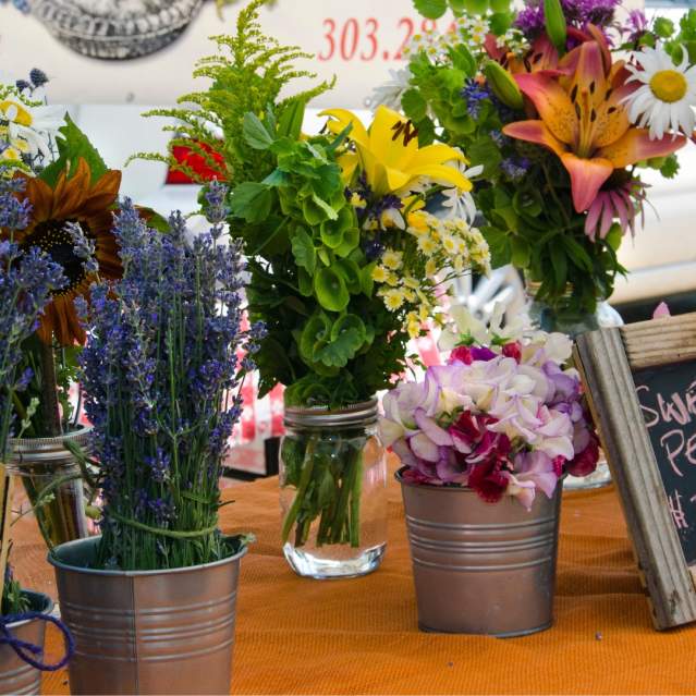 Flowers on a table at Longmont Farmer's Market