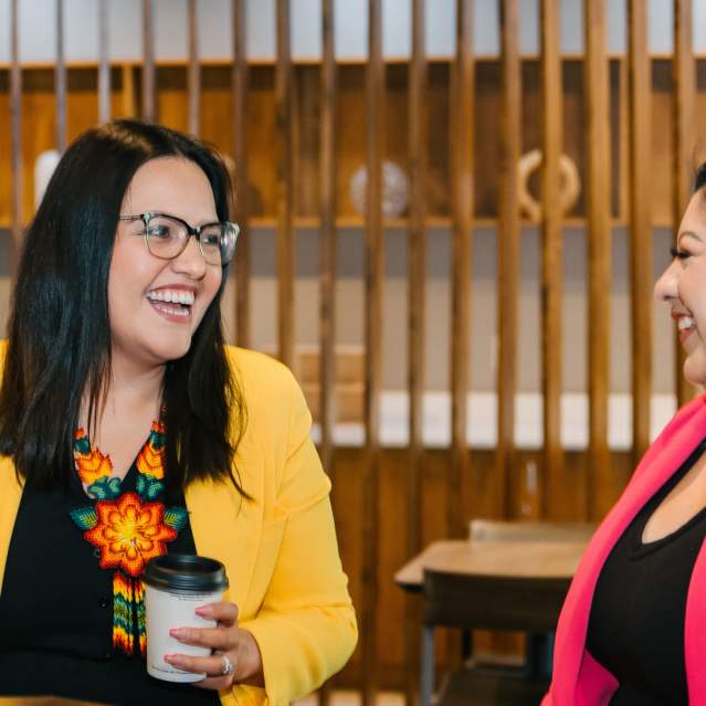 Two people at a meeting