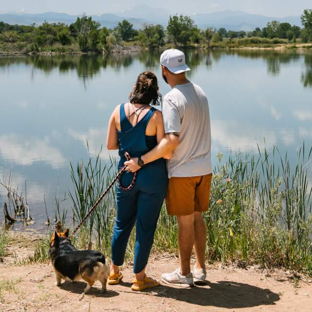 Couple standing and taking in Golden Ponds