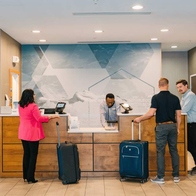 Guests checking in at a hotel