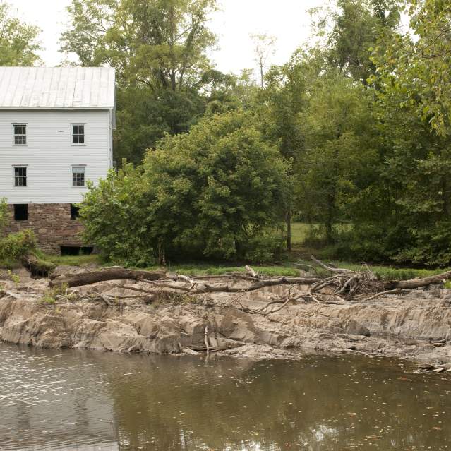 A historic building along a river