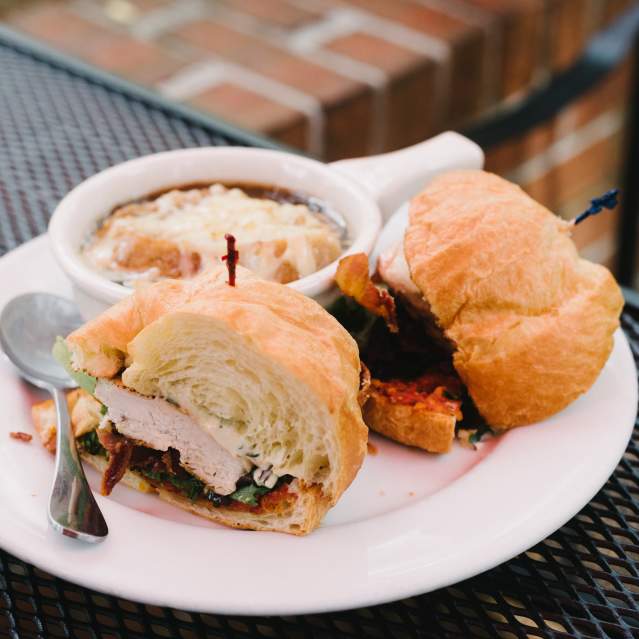 A sandwich and a cup of soup