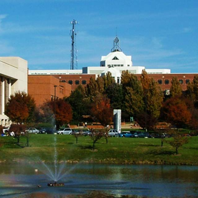 A pond in front of the Center of the Arts and the Johnson Center at George Mason University