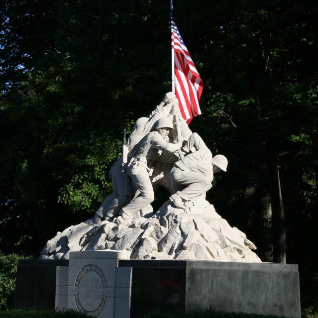 A statue of Marines putting up an American Flag