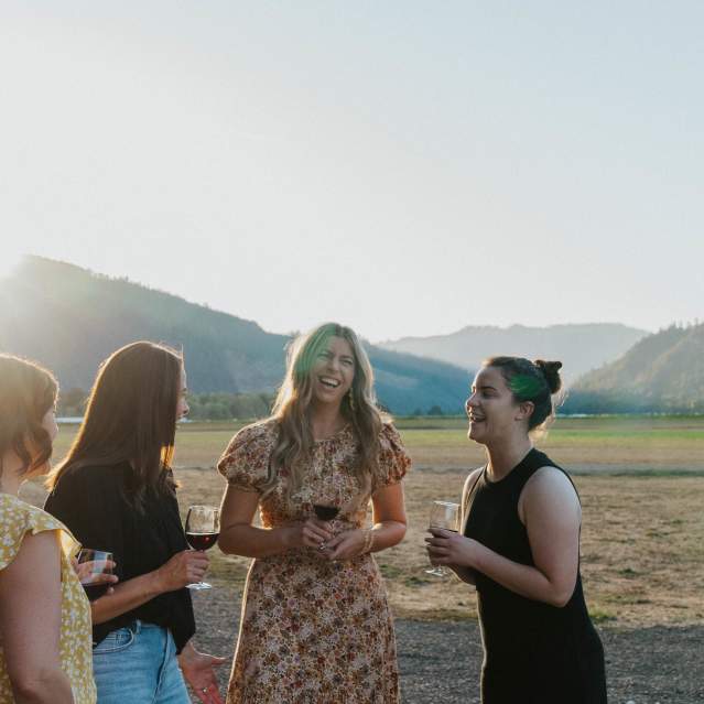 group of women drinking wine