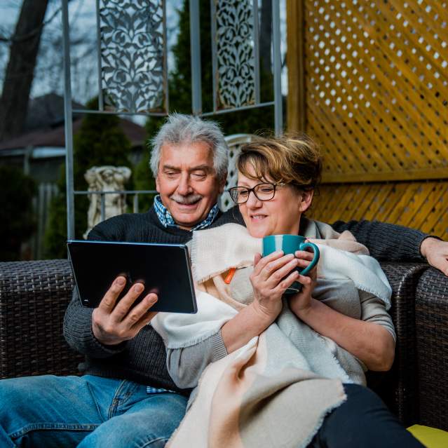 Couple looking at tablet