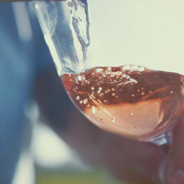 Closeup of wine pouring