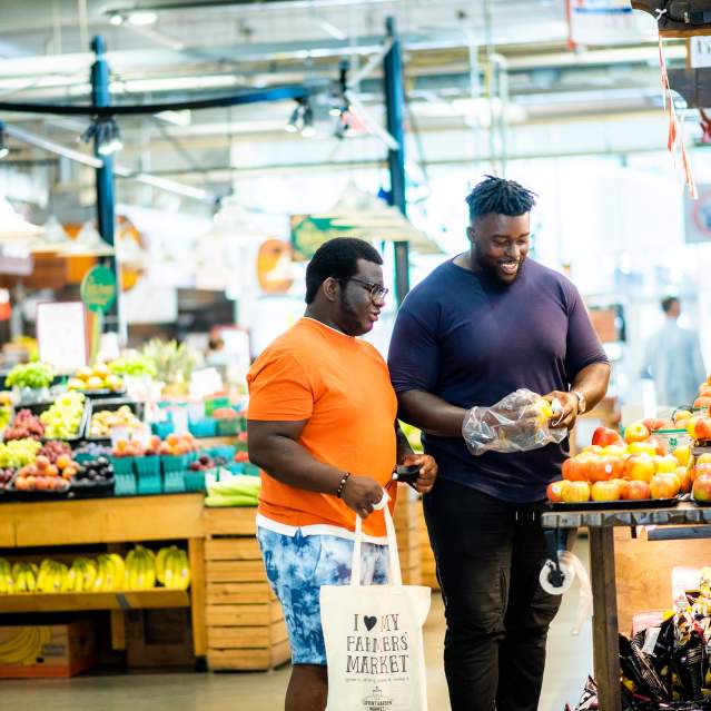 two men at farmers market