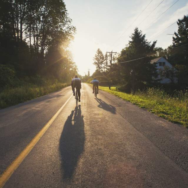 2 people cycling