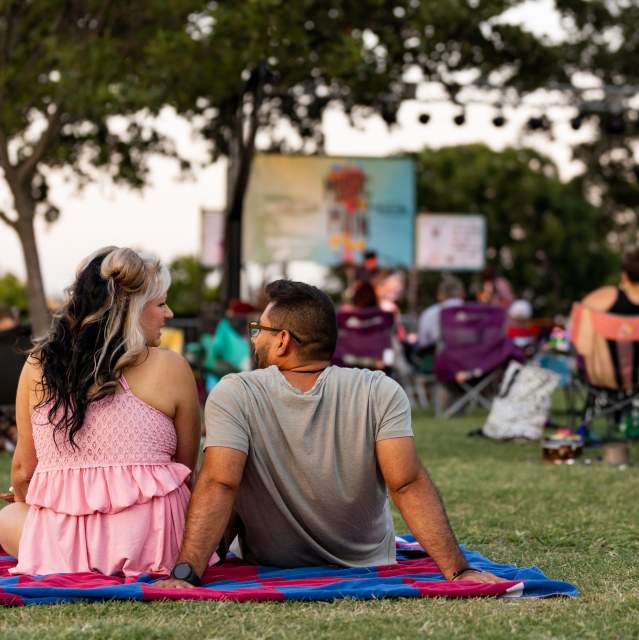 Couple enjoying live music together at Denison’s Music on Main event