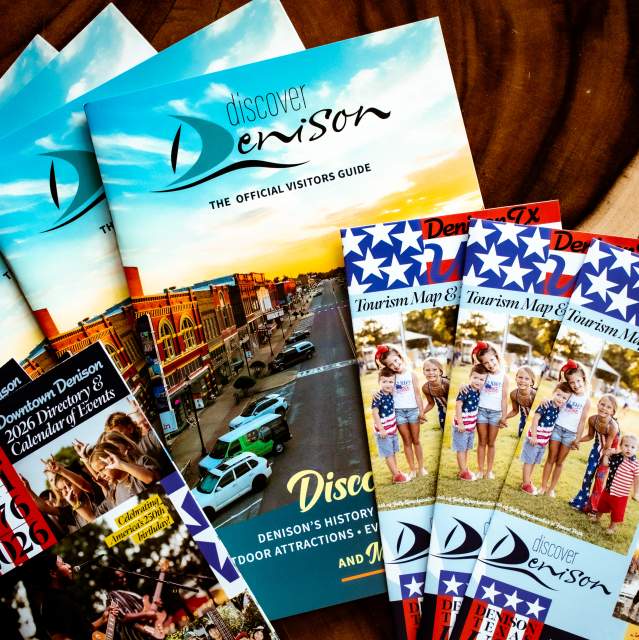 Visitor guides and tourism brochures available at the Discover Denison Visitor Center
