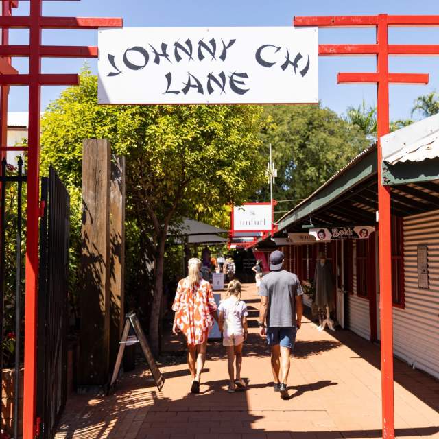 Family walking through Johnny Chi Lane in Broome's Chinatown