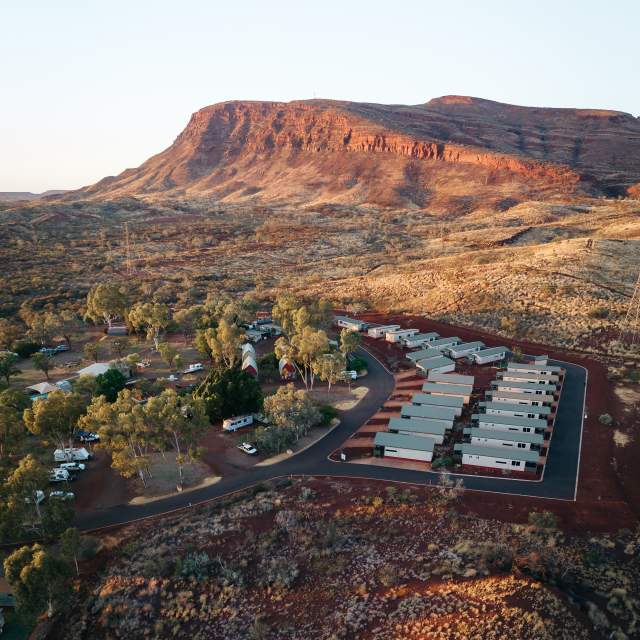 Aerial view of Summerstar Tom Price Tourist Park with Mt Nameless in the background