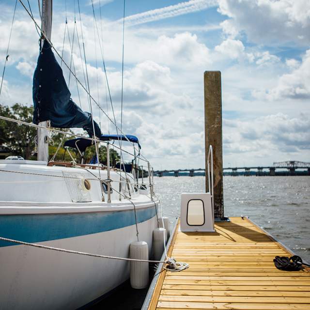 Sailboat by a dock