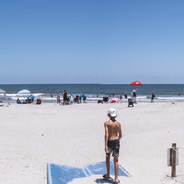 View of guests and swimmers at the Hunting Island State Park Beach