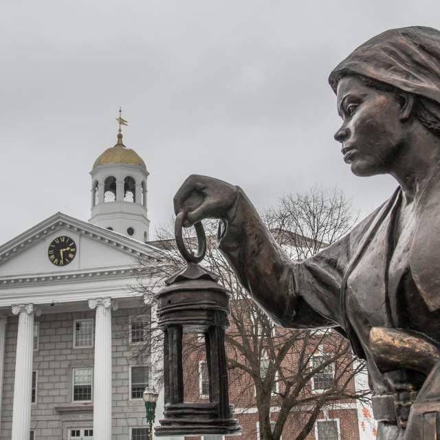 Harriet Tubman Statue with City Hall